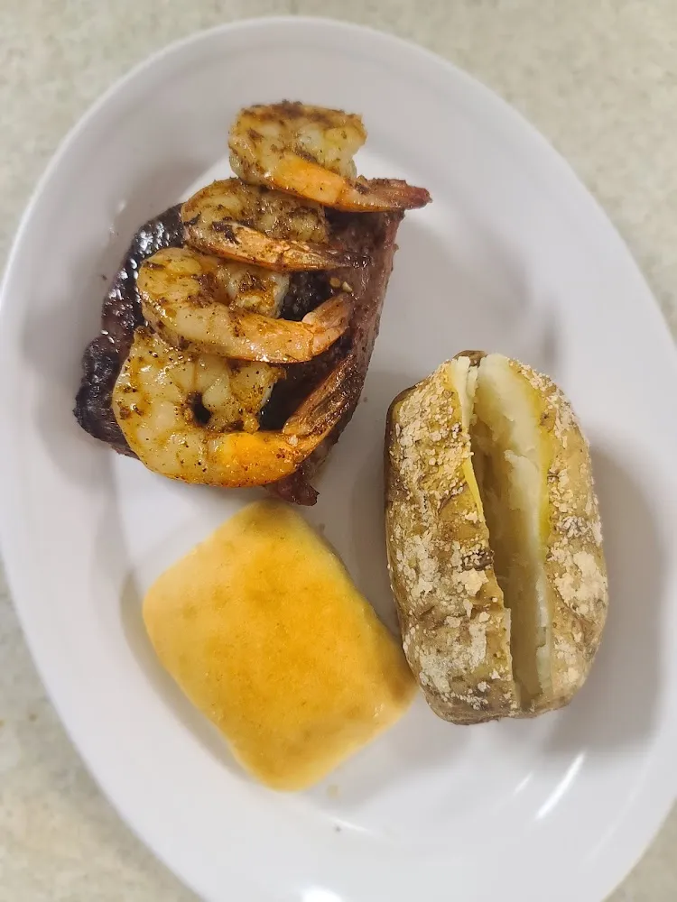 8 Oz Surf and Turf with Baked Potatoe and a Roll